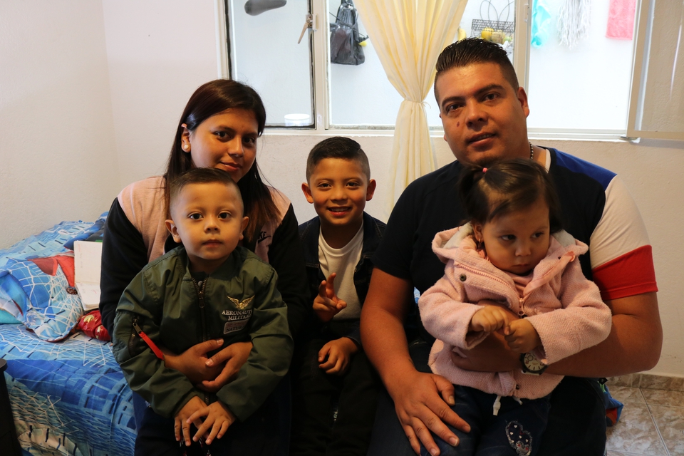 Camilo with his parents and siblings in Colombia