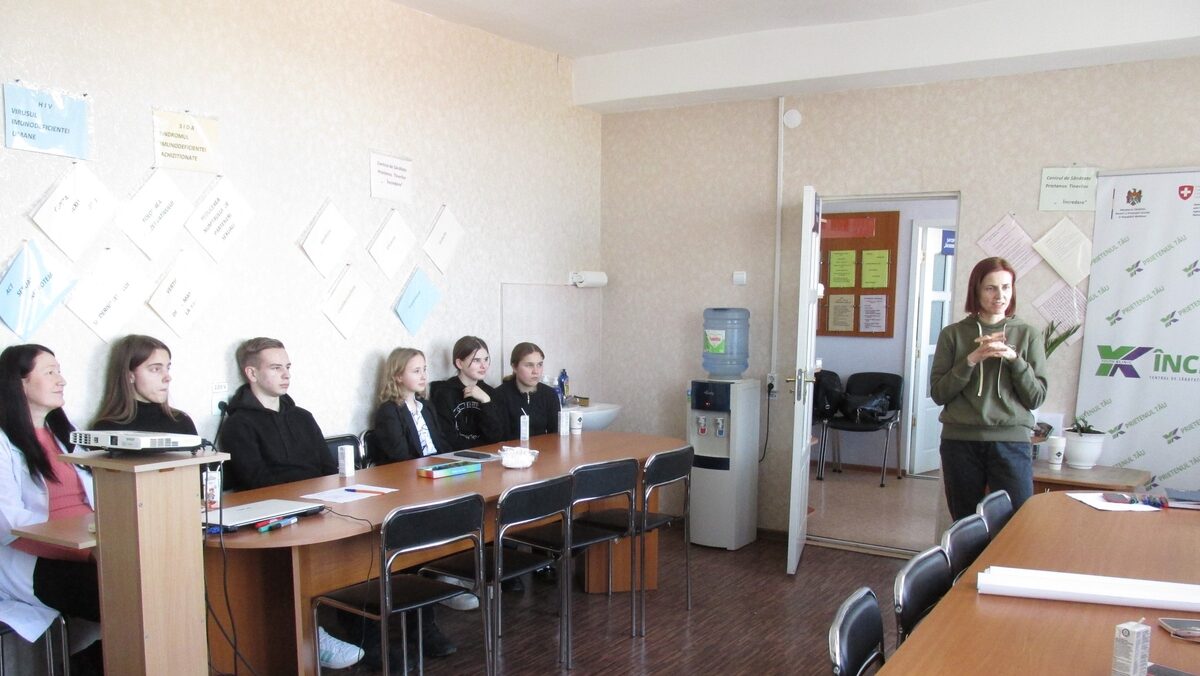 Children at a centre in Moldova sat at desks 